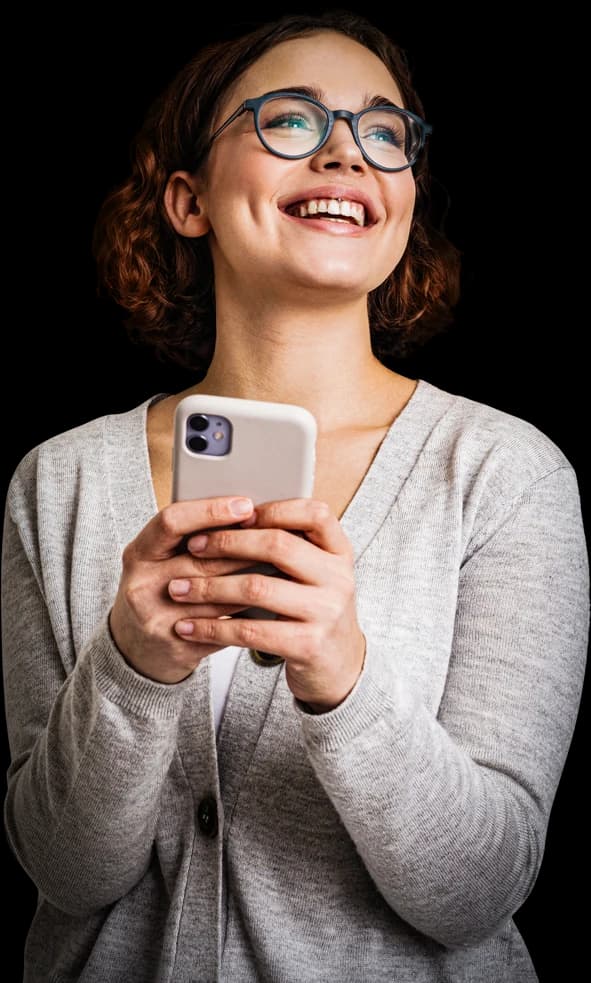 A smiling customer holding her phone